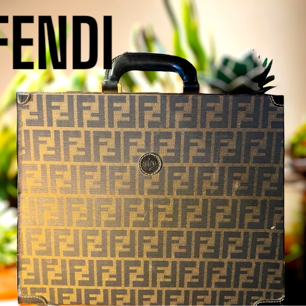 Fendi  briefcase like almost perfect for age. I had it appraised by the RealReal